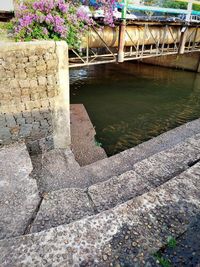 High angle view of bridge by lake