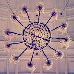 Low angle view of illuminated chandelier