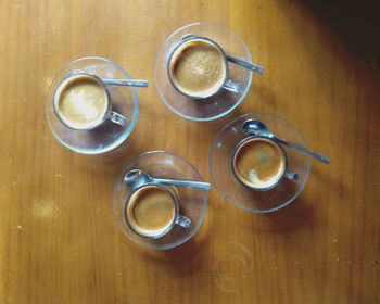 Close-up of coffee on wooden table