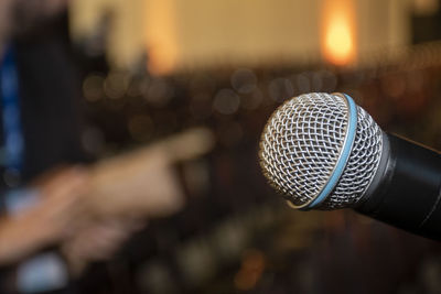 Microphone in conference room closeup with copy space