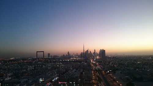 Aerial view of city buildings during sunset, dubai city