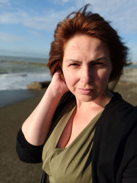 Portrait of young woman on beach