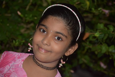 Close-up portrait of a serious young woman