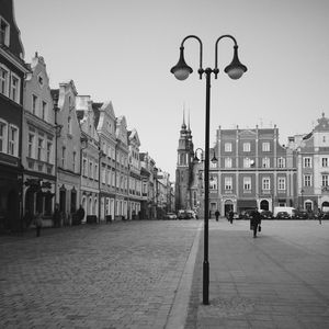Buildings in city against sky