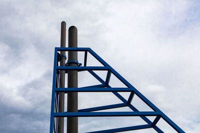 Low angle view of ladder against sky