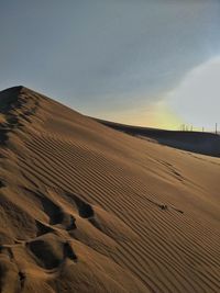 Scenic view of desert against sky