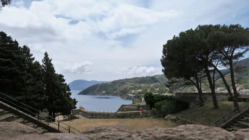 Scenic view of landscape and mountains against sky