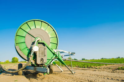 Irrigation system for watering of agricultural crops with a big hose reel. industrial equipment 