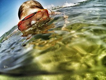 Reflection of woman in water