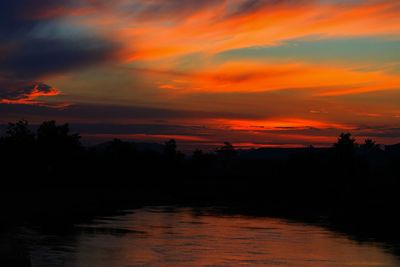 Scenic view of dramatic sky during sunset