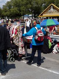 People at market stall