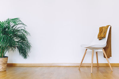 Empty chairs on table at home