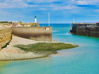 Scenic view of sea against blue sky