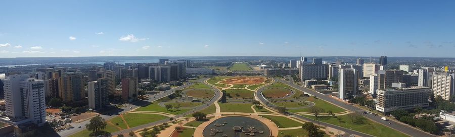 High angle view of city buildings against sky