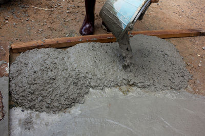 Close-up of hand working at construction site