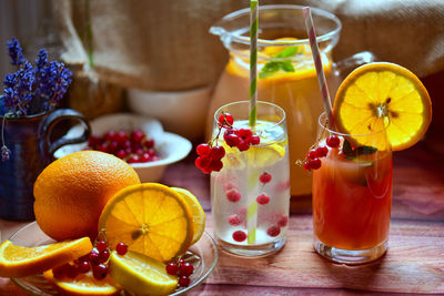 Fruits in glass on table