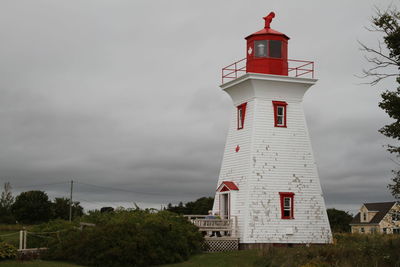 Lighthouse with red observation tower in the   maritimes