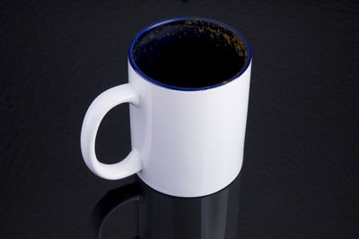 High angle view of coffee cup on table