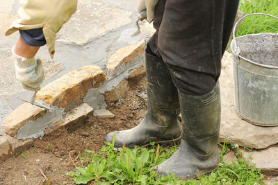 Low section of man working