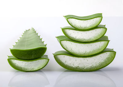 Close-up of green fruits on table