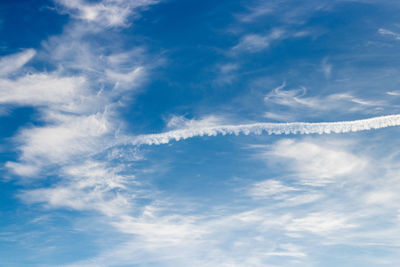 Low angle view of vapor trail in sky