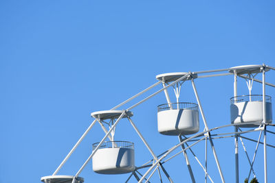 Low angle view of mast against clear blue sky