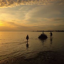 Scenic view of sea at sunset