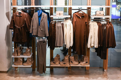 Shop window with brown clothes and shoes