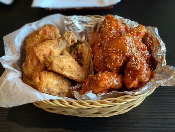 High angle view of bread in basket on table