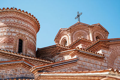 Low angle view of temple against building