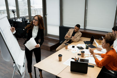 Business colleagues working in office