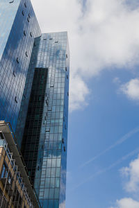 Low angle view of modern buildings against sky