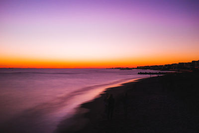 Scenic view of sea at sunset