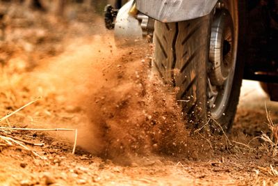 People working on dirt road