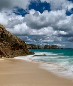 Scenic view of beach against sky