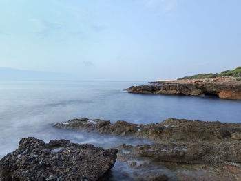 Scenic view of sea against clear sky