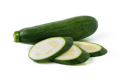 Close-up of green pepper against white background