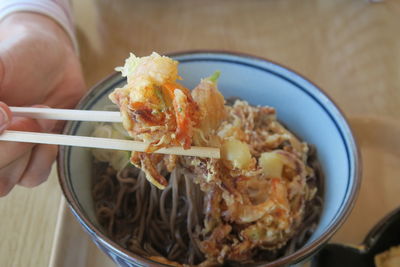 Close-up of hand holding food