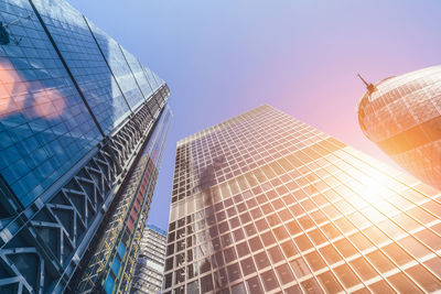 Low angle view of modern buildings against clear sky