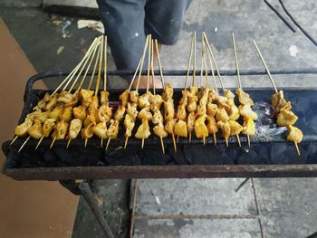 High angle view of meat on barbecue grill