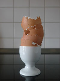 Close-up of fresh bread in cup