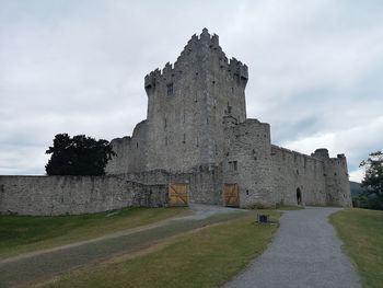 Historic building against cloudy sky