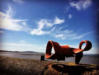 Scenic view of sea shore against sky