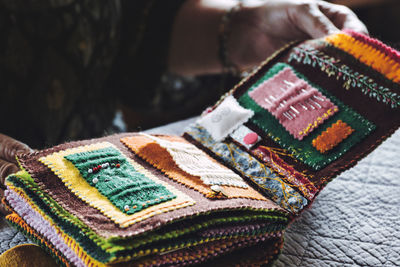 Felt book covered with colorful buttons and embroidery