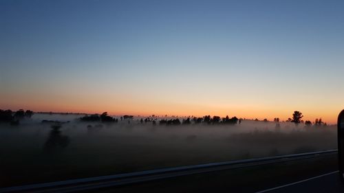 Panoramic view of landscape against sky during sunset