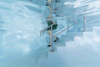 High angle view of people on swimming pool