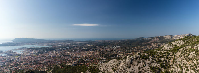 Aerial view of townscape against sky