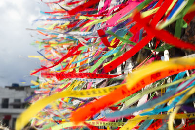 Colored ribbons attached to the iron grid. 