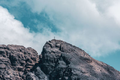 Low angle view of rock formation against sky