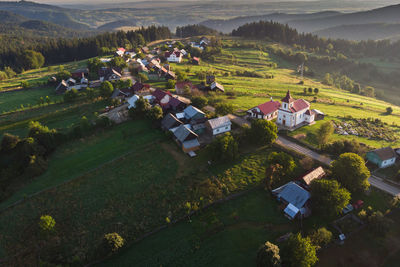 High angle view of agricultural field and houses